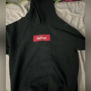 Tana Mongeau’s Hugh Hefner Merch Hoodie